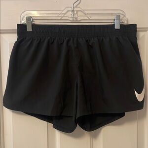 Nike Women's Black Shorts with Big White Swoosh Size Large L